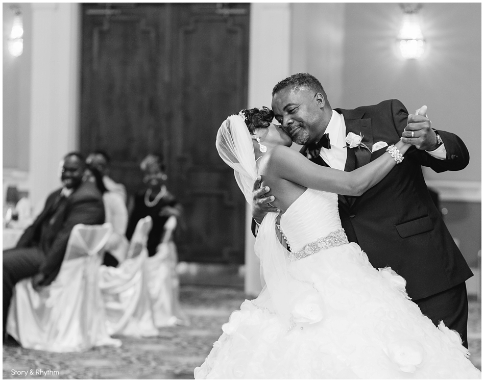 The bride dancing with her father 