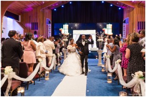 The bride and groom exiting the church