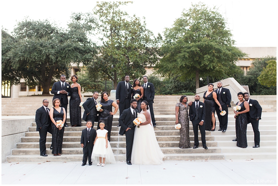 Wedding party with black suits and black sequin dresses
