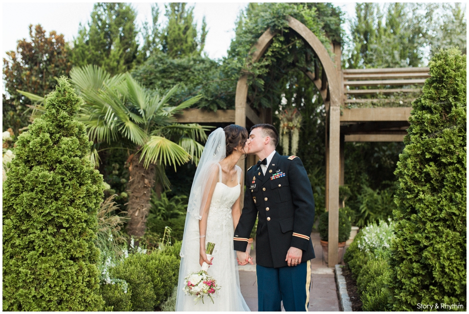Bride and groom kissing at Duke Gardens