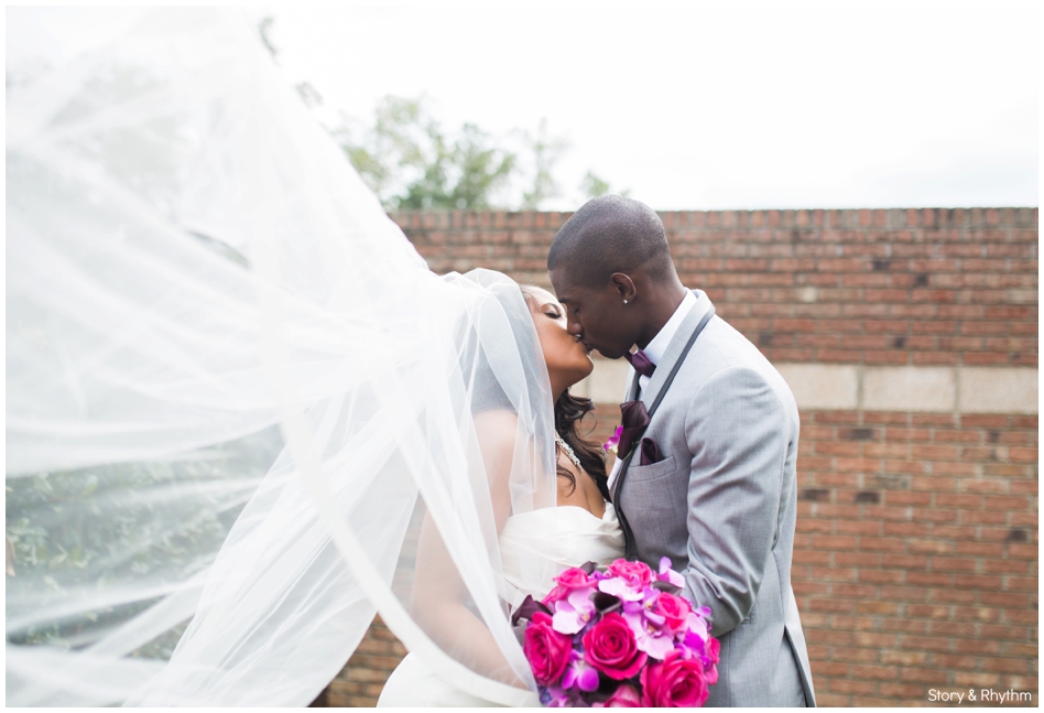bride and groom kissing