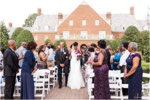 Bride walking down the aisle at Founders Inn wedding