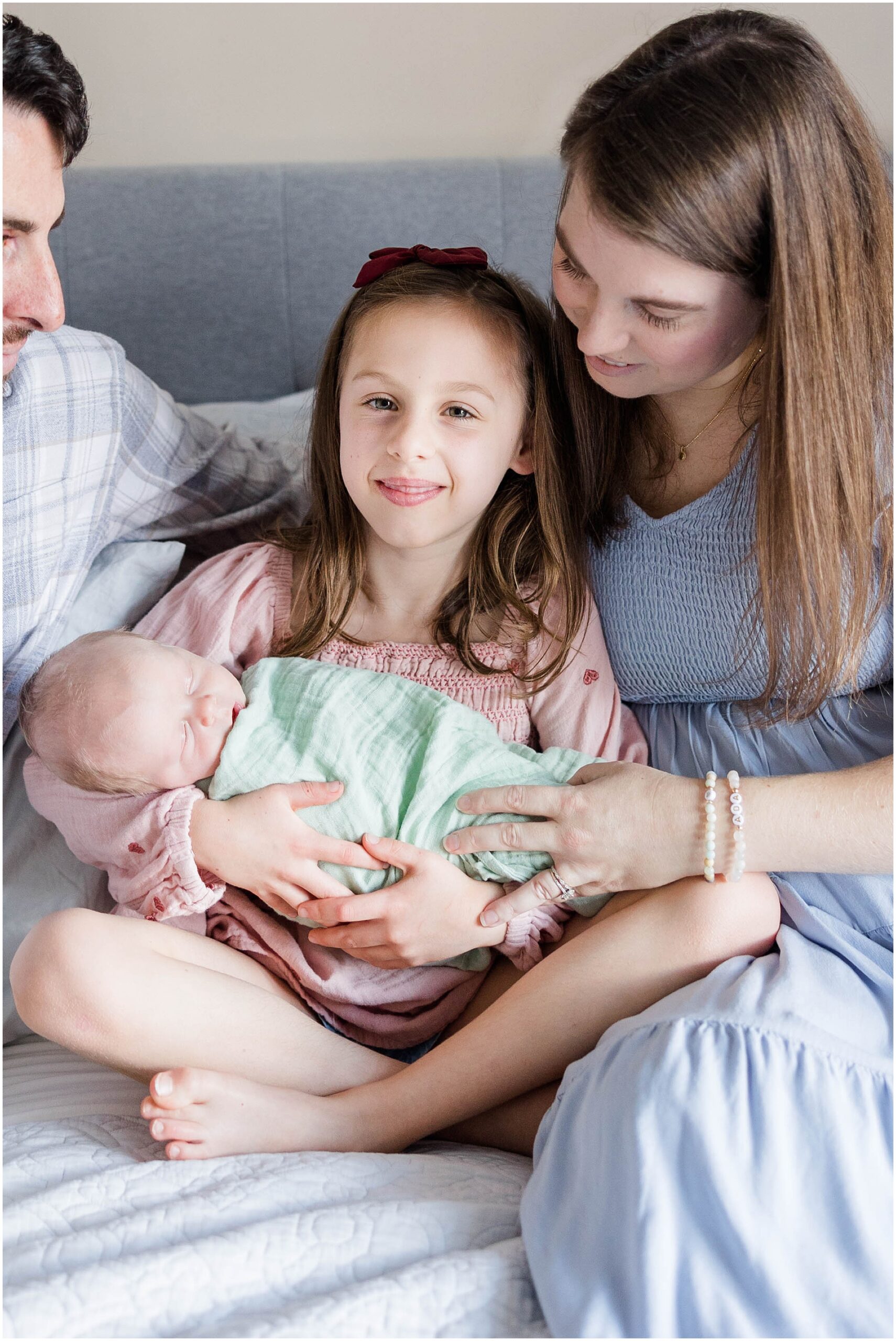 Family portraits at home with newborn